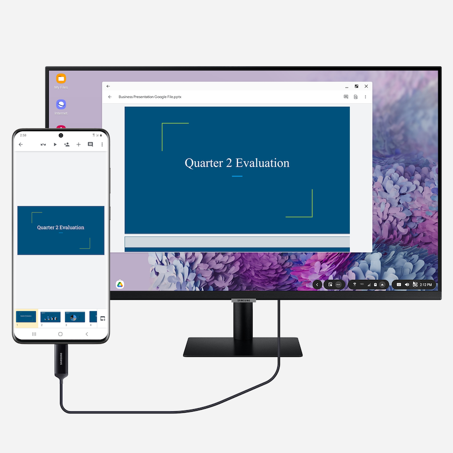 A Galaxy smartphone connected to a desktop monitor with Samsung DeX